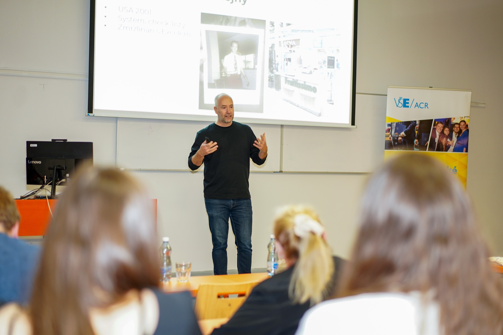 Jan Hummel lecturing students at the Prague University of Economics and Business